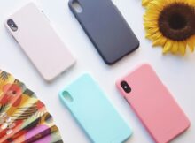 four assorted-color iPhone X cases